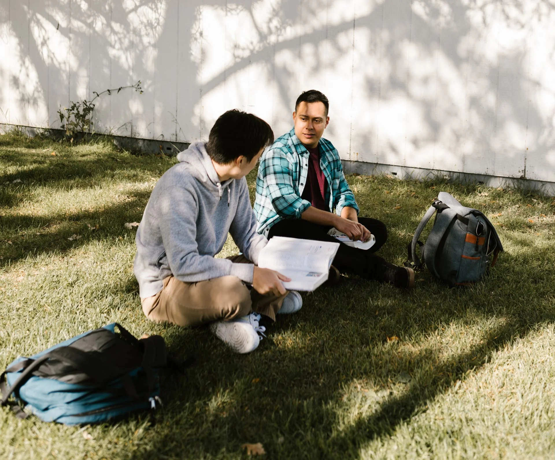 Two men sitting outdoors having an honest conversation about what pornography is doing for you and the real need behind porn addiction